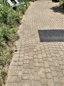 after using the paver cleaning tool this is a long view of the area