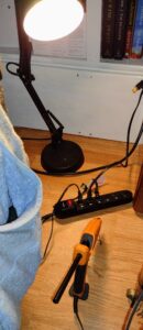 Use a power strip with a light plugged in to remind you that some device that might be unsafe if left on is on.