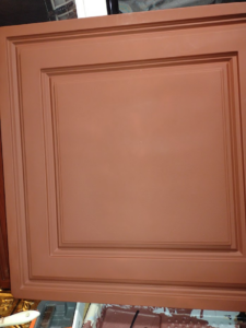 White tile primed with Rustoleum rusty metal spray paint