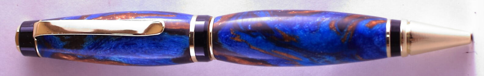 Dragon Slayer pen in blue resin with copper veins